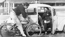 Going the wrong way down a one-way street gets you a ticket—even if you were on a bicycle. (Copyright Illini Media / 1959 Illio) 1959 car