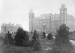 The since-razed University Hall (on right; Chemical Laboratory--now Harker Hall--on left) became the cornerstone in today's Quad. (Photo courtesy of University Archives) Quad